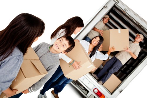 Moving van and packed boxes for removals in Marksgate