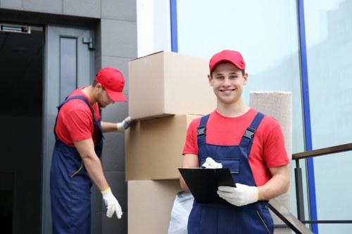 Moving van and packed boxes for house removals in Marksgate