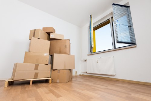 Professional removals team handling furniture in Marksgate
